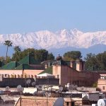 Marrakech_Riad_Al_Ksar_with_royal_palace_and_atlas_mountains_view_from_hotel_terrace