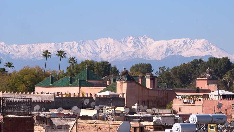 Marrakech_Riad_Al_Ksar_with_royal_palace_and_atlas_mountains_view_from_hotel_terrace